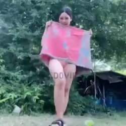 Thai girl shows off her body in backyard outdoor