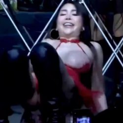 Busty Thai gal hot stage dance waits lucky guy press the erotic button