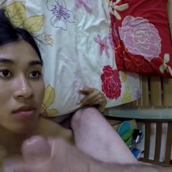 Asian fucktoy takes her first facial cumshot